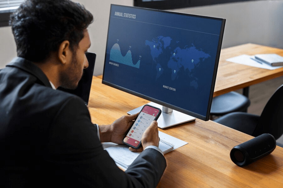 Business person looking at finance graphs Business person looking at finance graphs